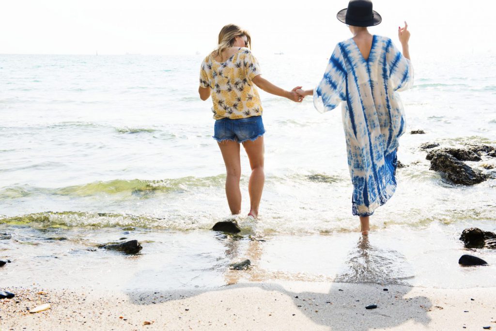 Women having fun on the beach in Providenciales Turks and Caicos